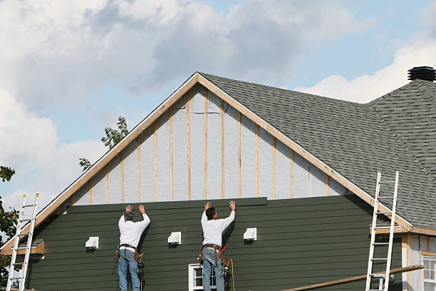 Professional Emergency Siding Repair technician working in Greens Fork, IN